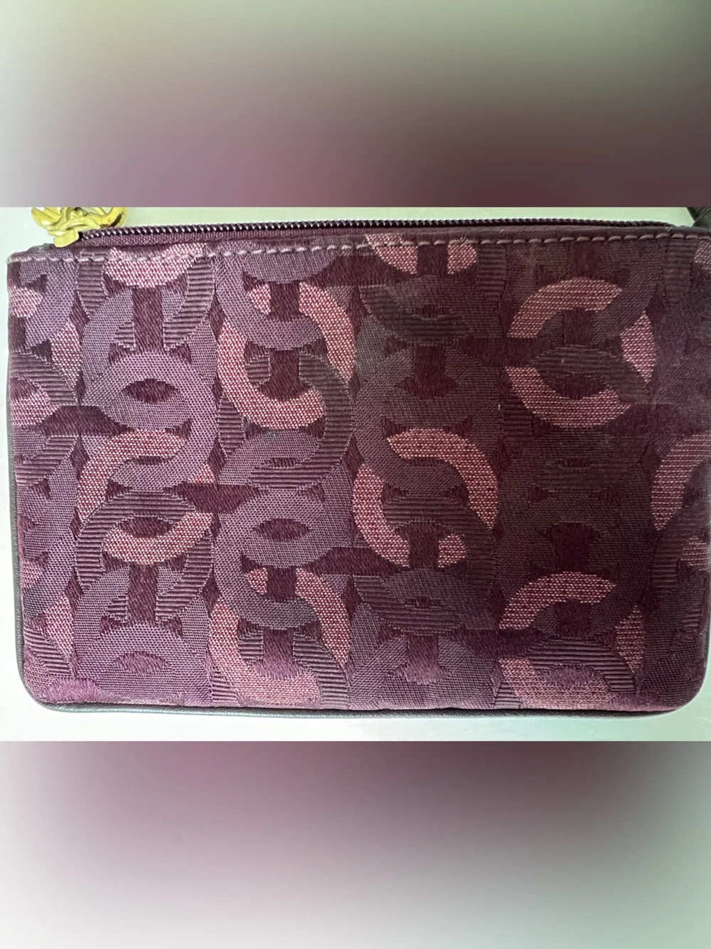 Purple jacquard Coach wristlet